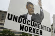 Demonstrators holds up banners during the taxpayer rally at Freedom Plaza in Washington, Sept. 12, 2009.