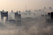 Buildings are seen amid heavy fog in Wuhan, Hubei province December 3, 2009.