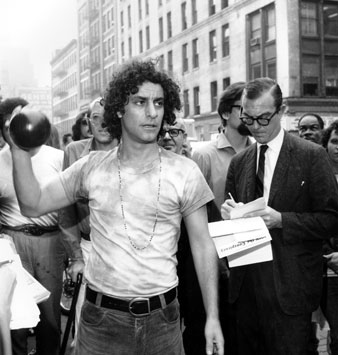 Abbie Hoffman holds a toy bomb in New York City on Sept. 16, 1969. AP Images<br/> 