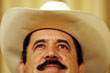 Zelaya points to a State Department document as he speaks to the media following his meeting with Clinton on September 3, 2009.