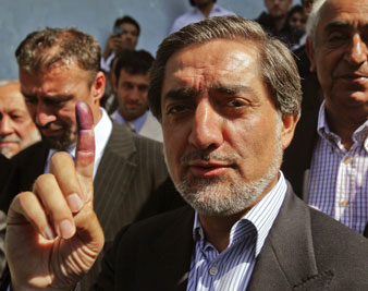 Abdullah Abdullah shows his finger marked with paint after voting at a polling station in Kabul, Thursday, Aug. 20, 2009. AP Images</br> 