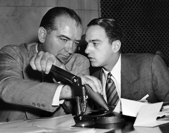 Roy Cohn (right) with Sen. Joseph McCarthy, during a committee hearing in Washington on April 26, 1954. AP Images</br> 