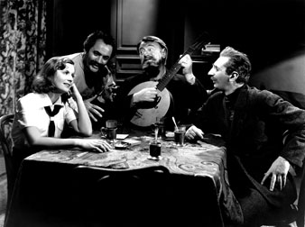 Greta Garbo, Alexander Granach, Sig Rumann, Felix Bressart singing in <i>Ninotchka</i>, 1939. Everett Collection 