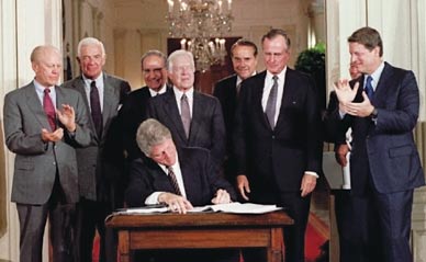 President Clinton at a 1993 NAFTA signing ceremony REUTERS/WIN MCNAMEE 
