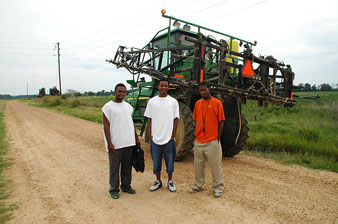 David J. Brown, Shamaine Howard, Russell Scott. More young farmhands in the field. Photo by Habiba Alcindor 