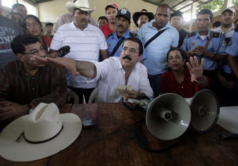 Ousted Honduras President Manuel Zelaya talks to his supporters at the temporary shelter in Ocotal. Reuters Pictures<br/> 
