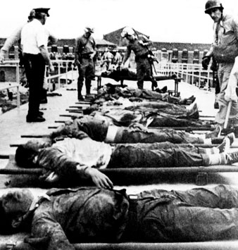Police officers identify dead bodies at Attica prison, 1971. CSU Archives/Everett Collection 