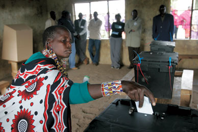 A Masai woman casts her ballot during the December 2007 presidential election. KAREL PRINSLOO/AP 