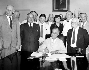 Franklin Roosevelt signs the Social Security Act of 1935 ASSOCIATED PRESS 